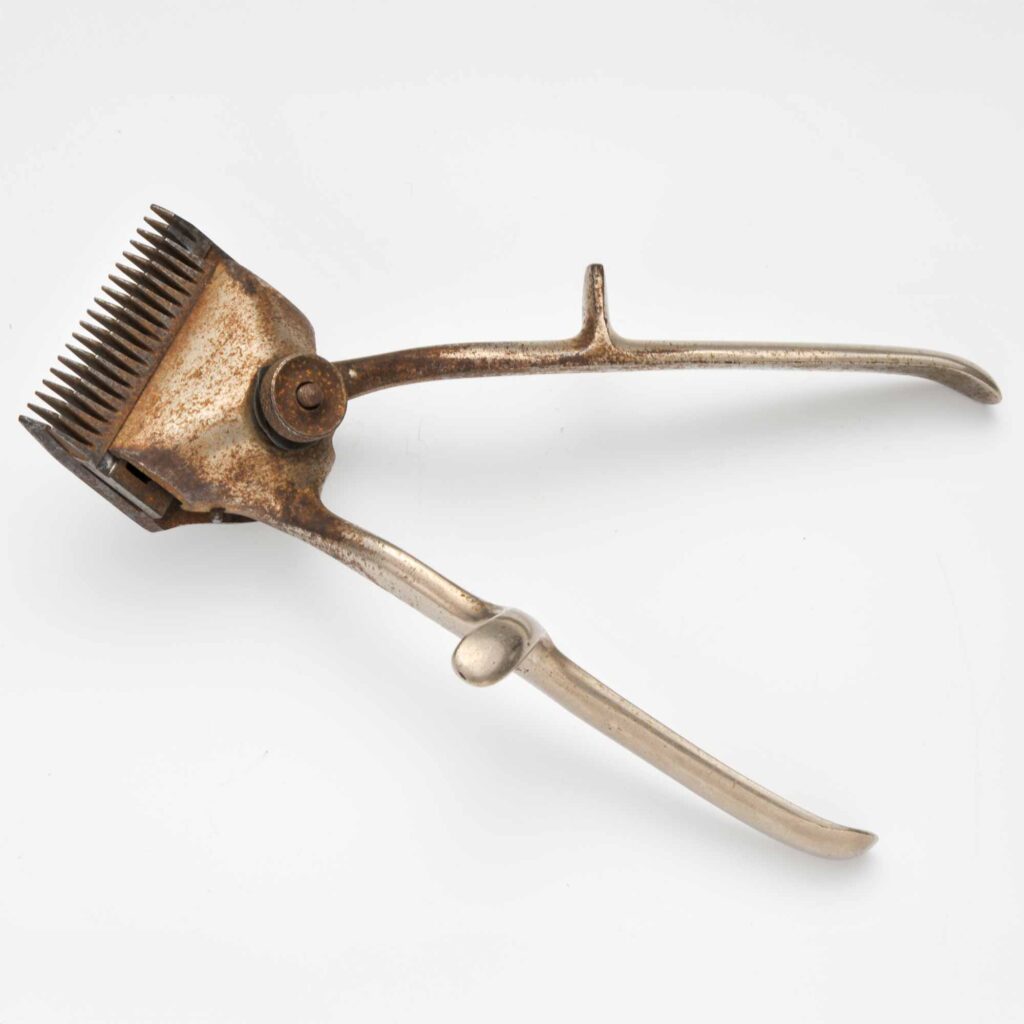 手バリカン内バネ