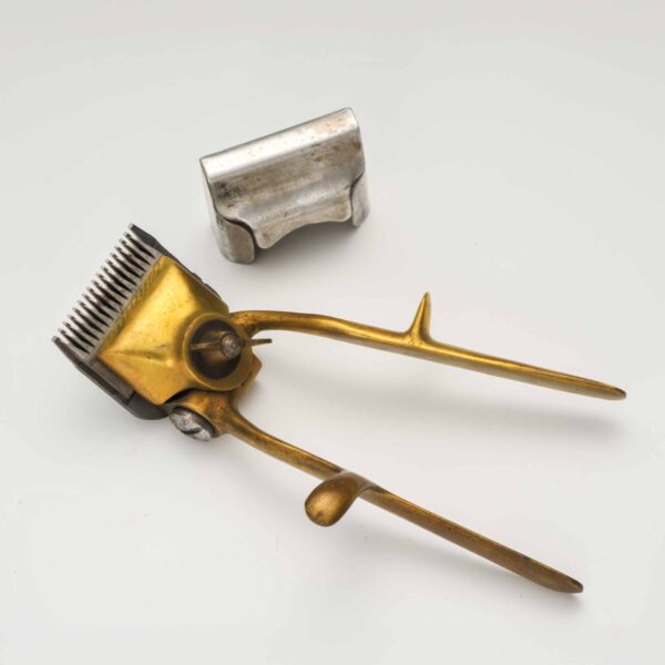 手バリカン内バネ